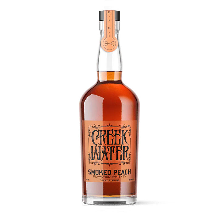 Buy Creek Water Smoked Peach Whiskey online at whiskeyshipped.com and have it shipped to your door nationwide.