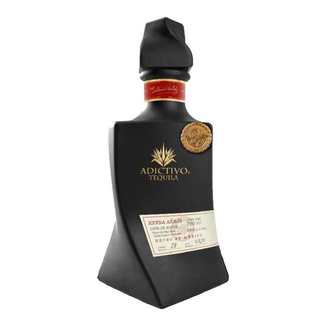 Buy Tequila Adictivo Extra Añejo is 100% pure Blue Agave, dark amber with reddish hues with excellent roasted flavor, sweet and fruity aromas.
This Extra Anejo is bottled in a Limited Edition Black Ceramic bottle online at whiskeyshipped.com and have it shipped to your door nationwide.